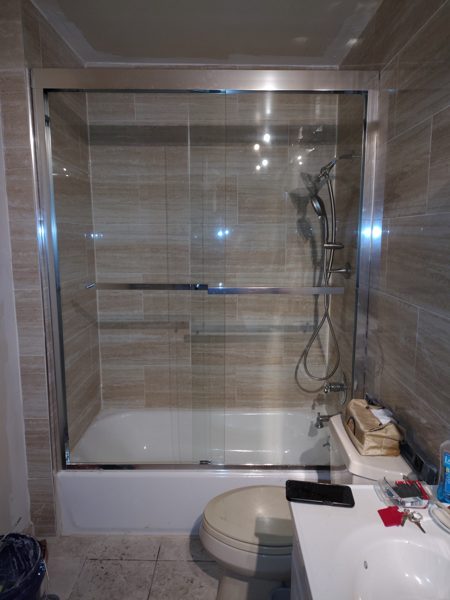 Tub & Glass Enclosure — Bathrooms project by NC Total Construction