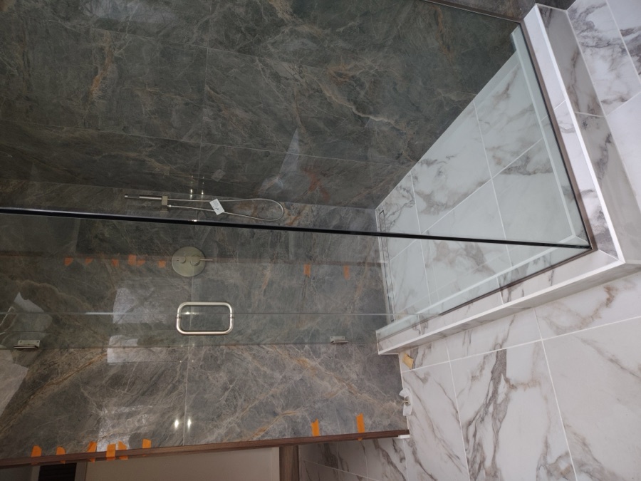 Custom marble walk-in glass shower bathroom remodel