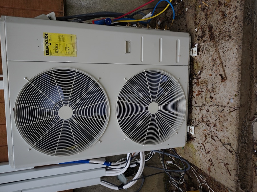 New HVAC condenser unit installation